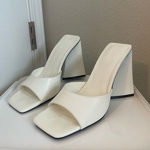 White triangle heels